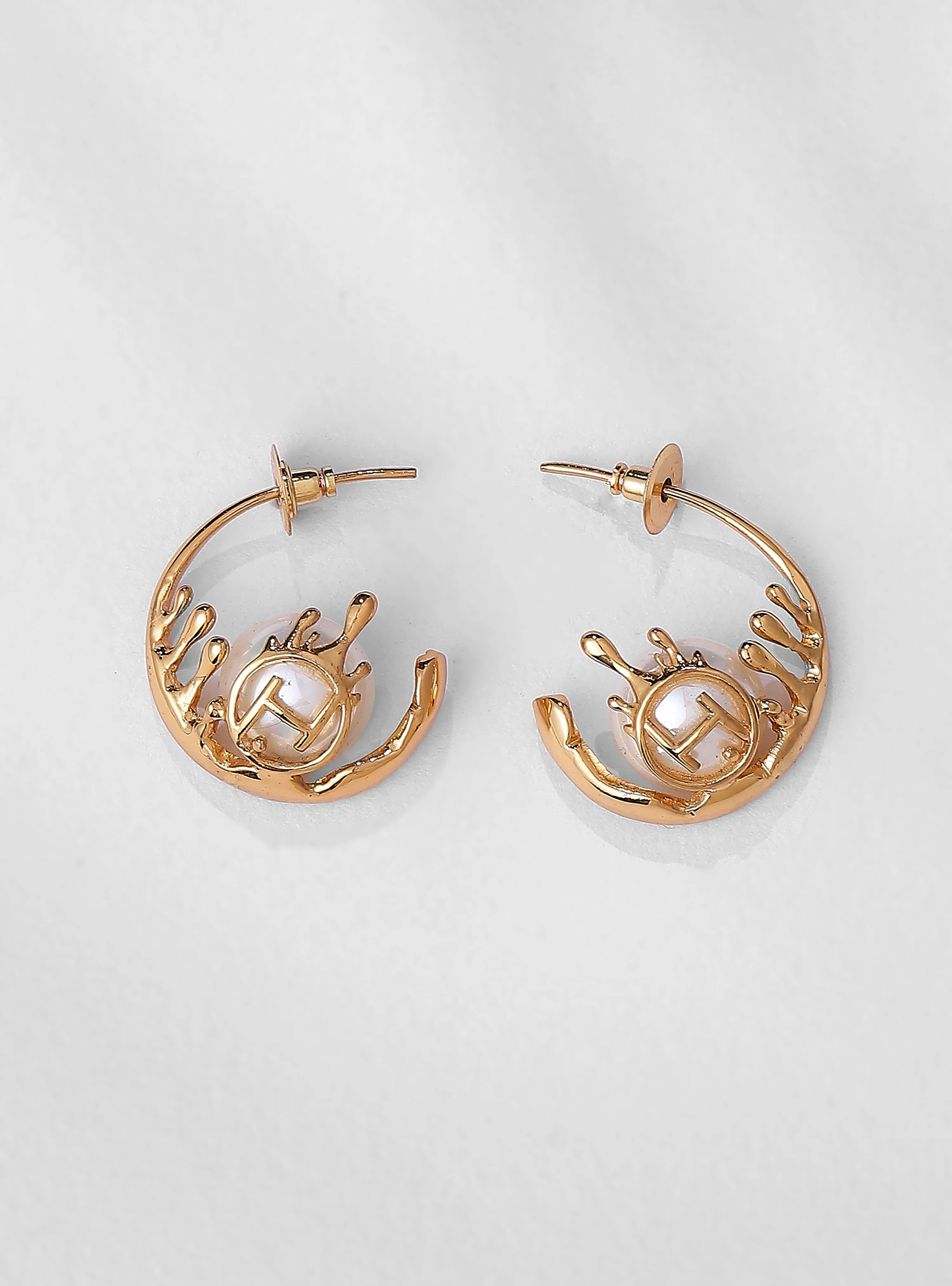 Alaya F Wearing Drip OH Nora Hoop Earrings