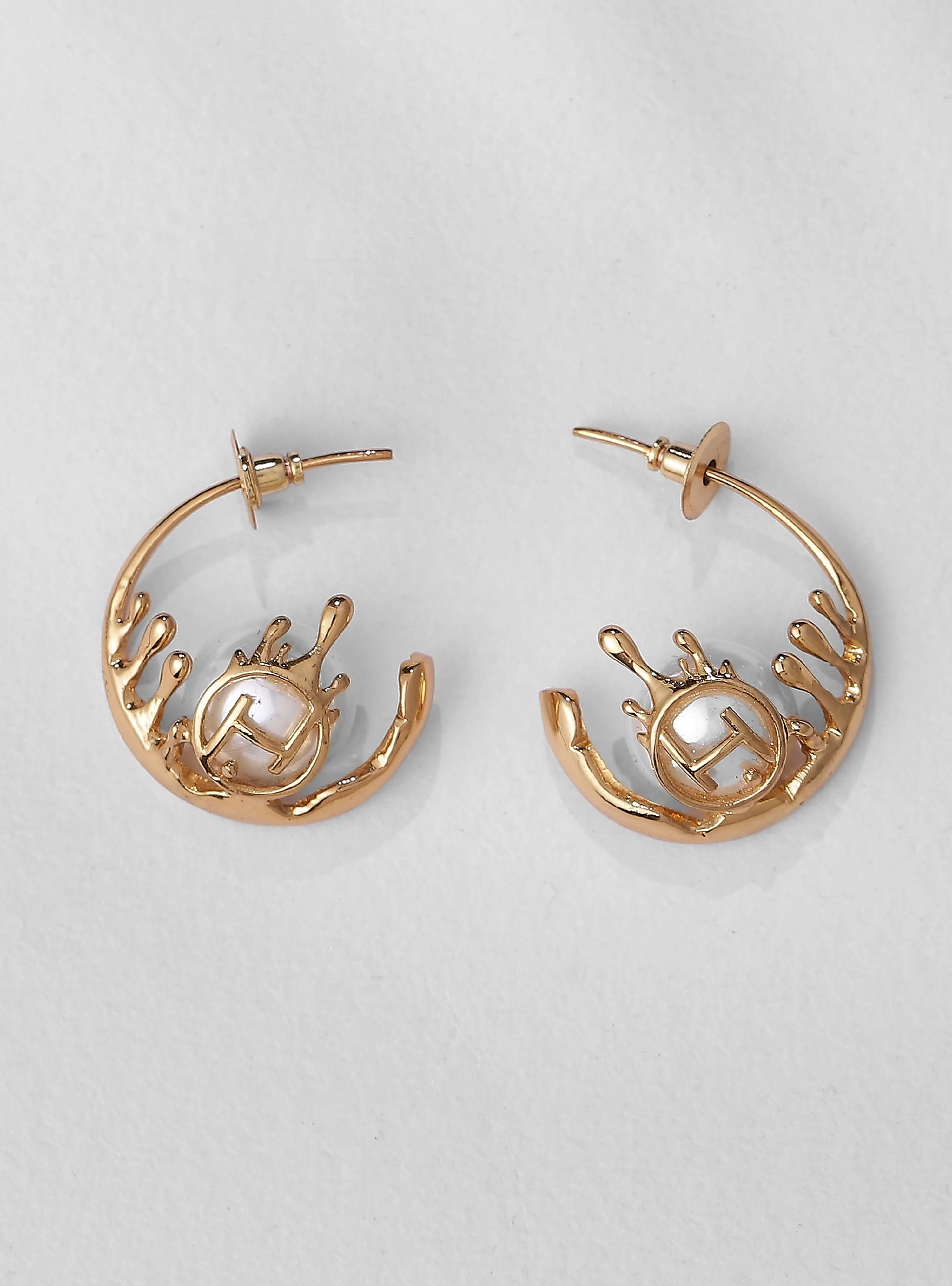 Alaya F Wearing Drip OH Nora Hoop Earrings