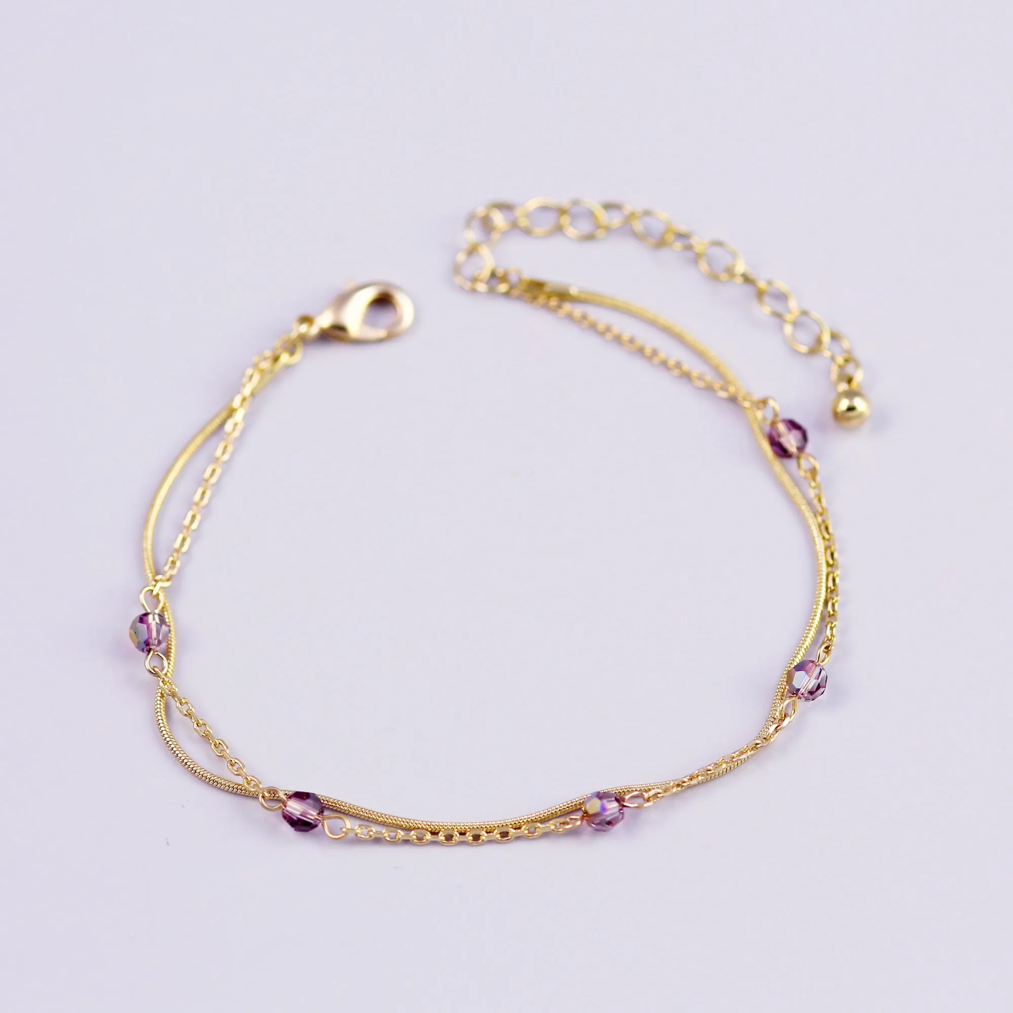 Delicate Gold Bracelet with Light Amethyst Crystals