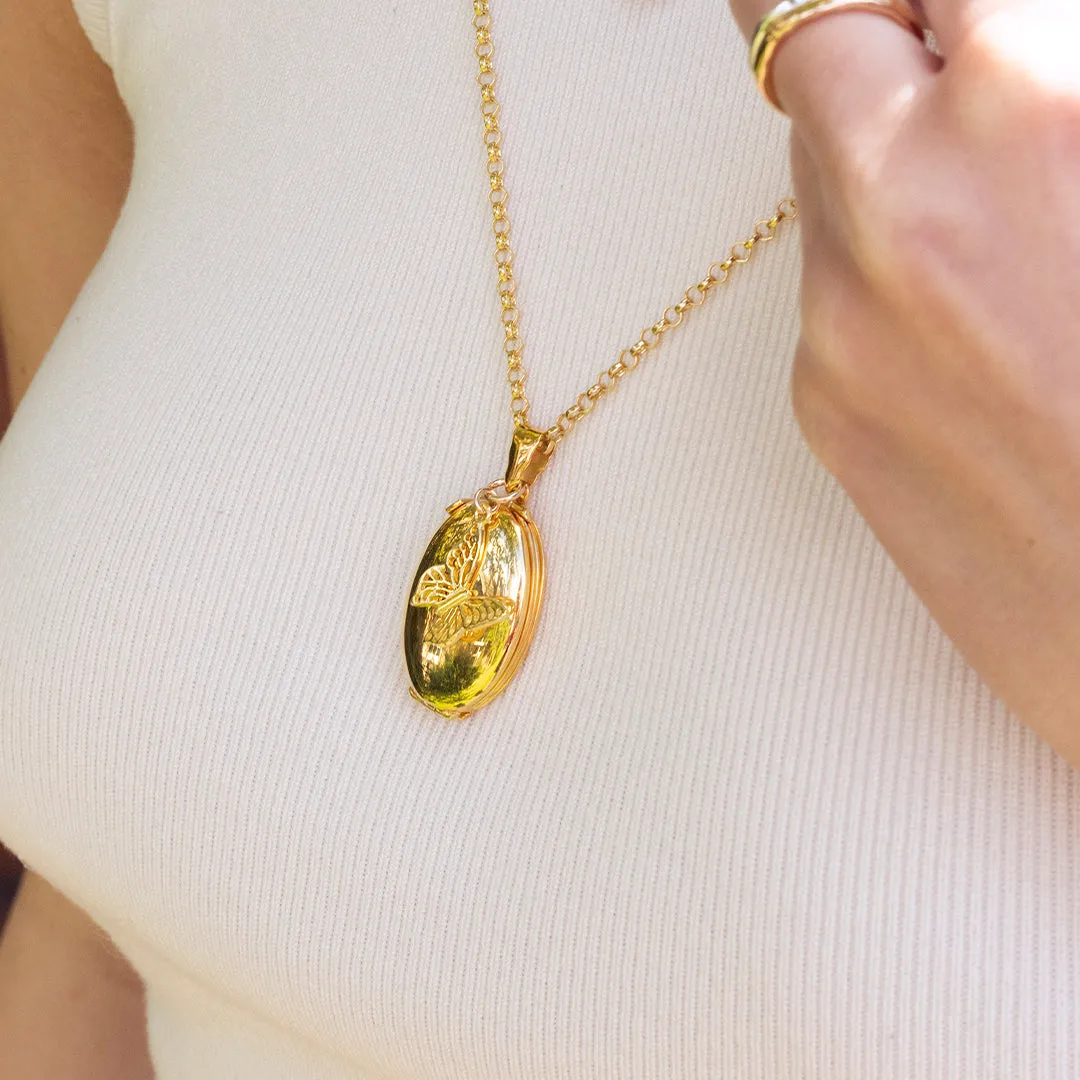 Four Photo Oval Butterfly Locket Gold   Photos