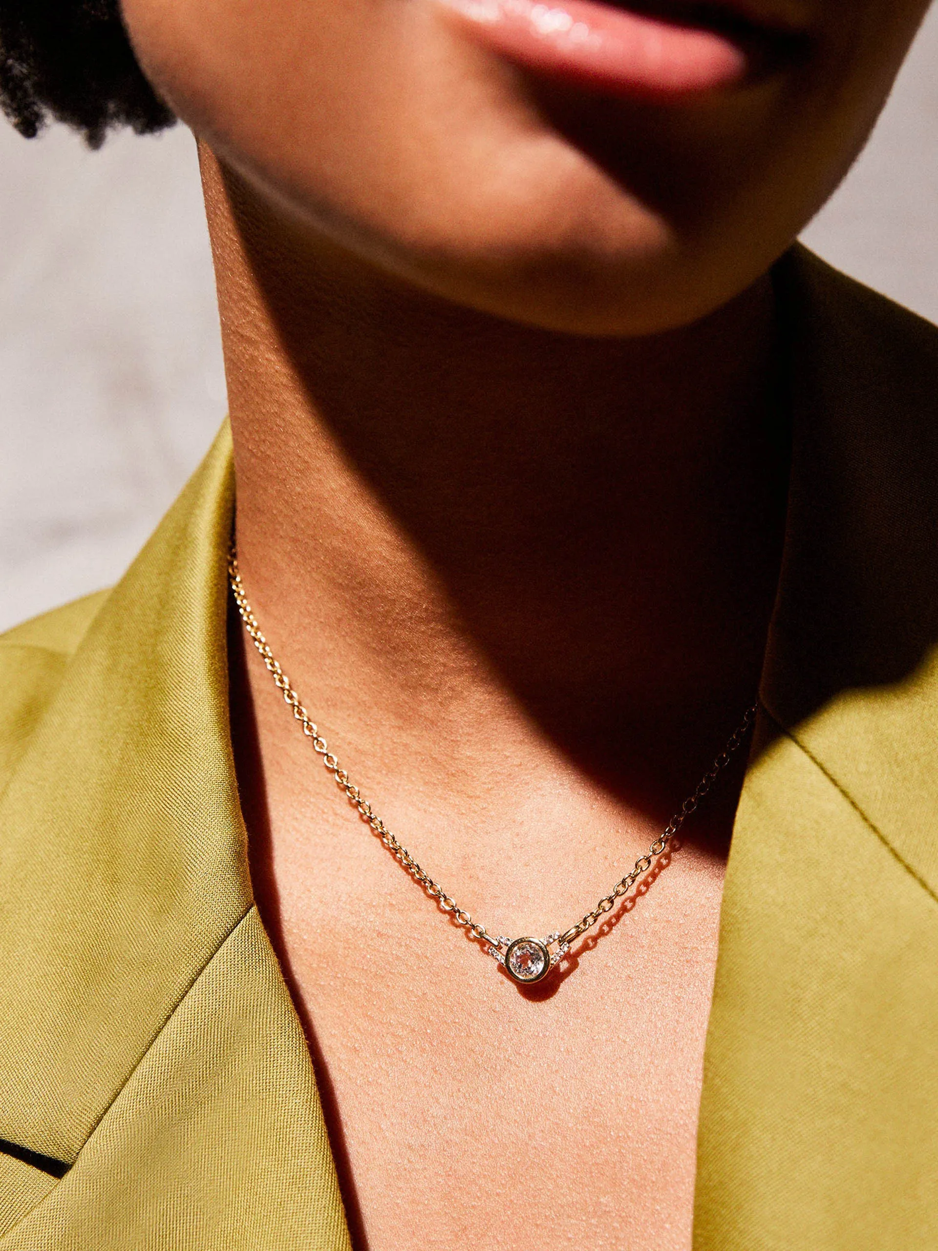 Gold Lucy choker necklace with white topaz