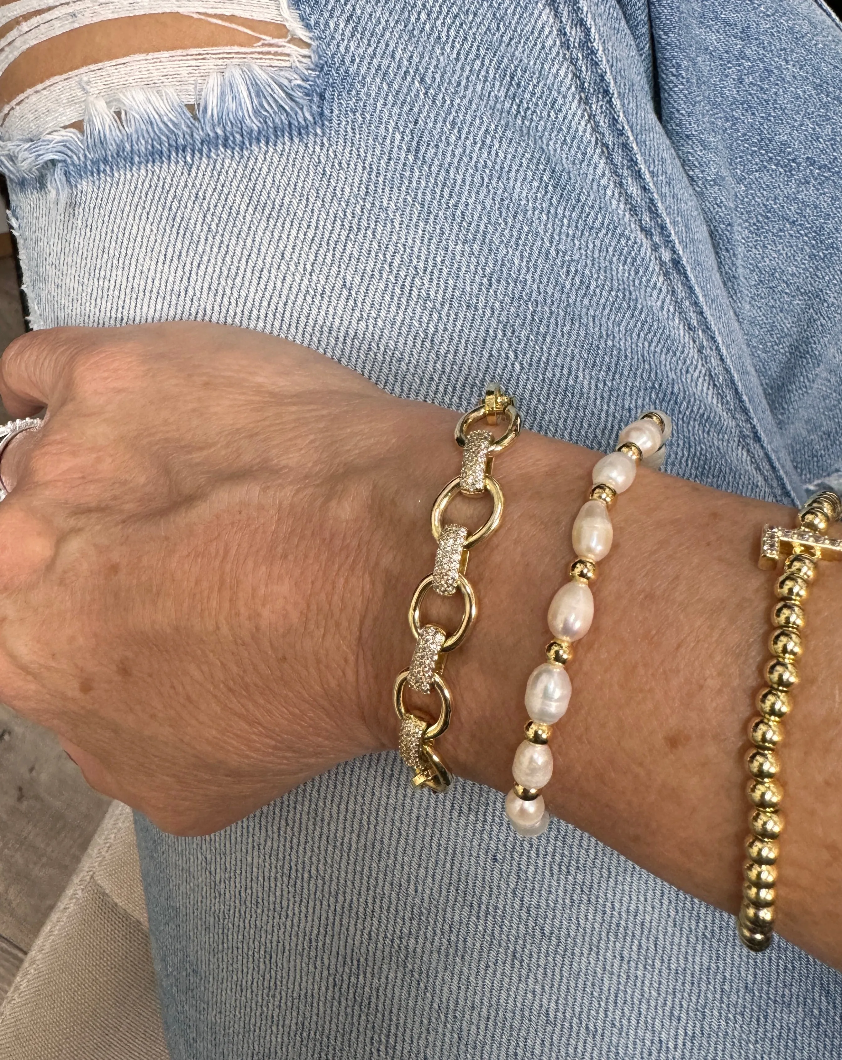 Gold Ovals with CZ Covered Links Bracelet