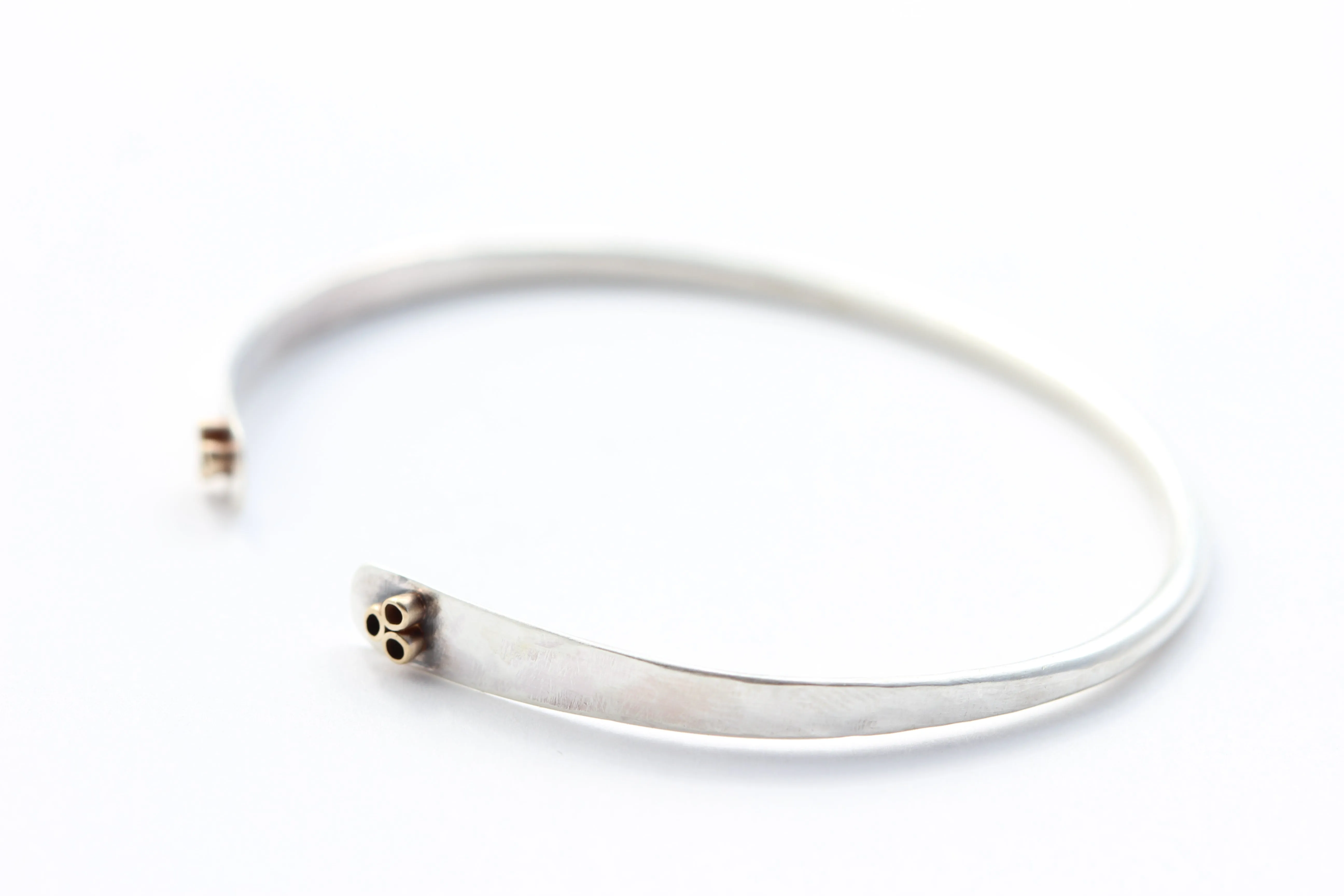 Hammered Sterling Silver Bracelet With 14k Gold flower tubes