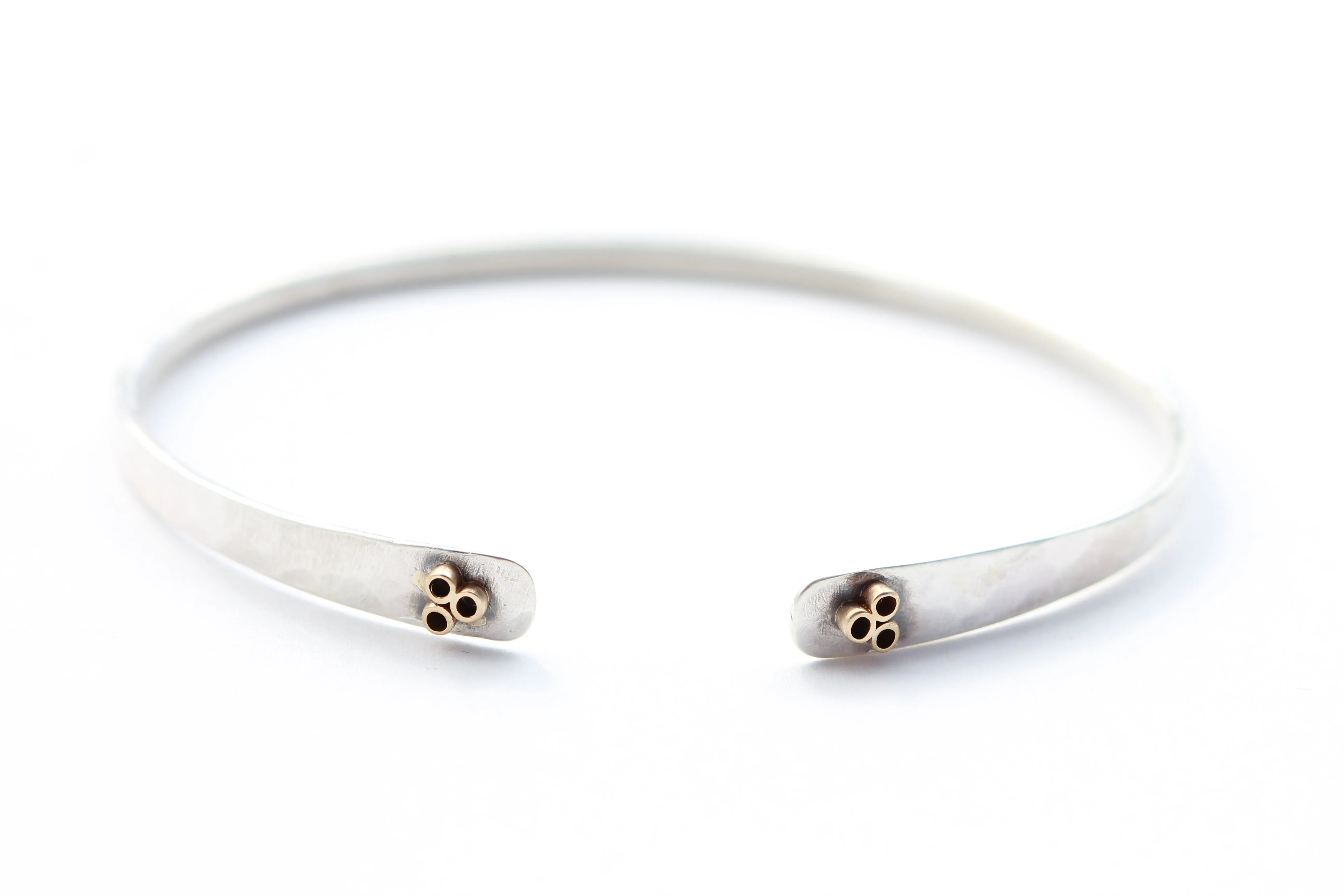 Hammered Sterling Silver Bracelet With 14k Gold flower tubes