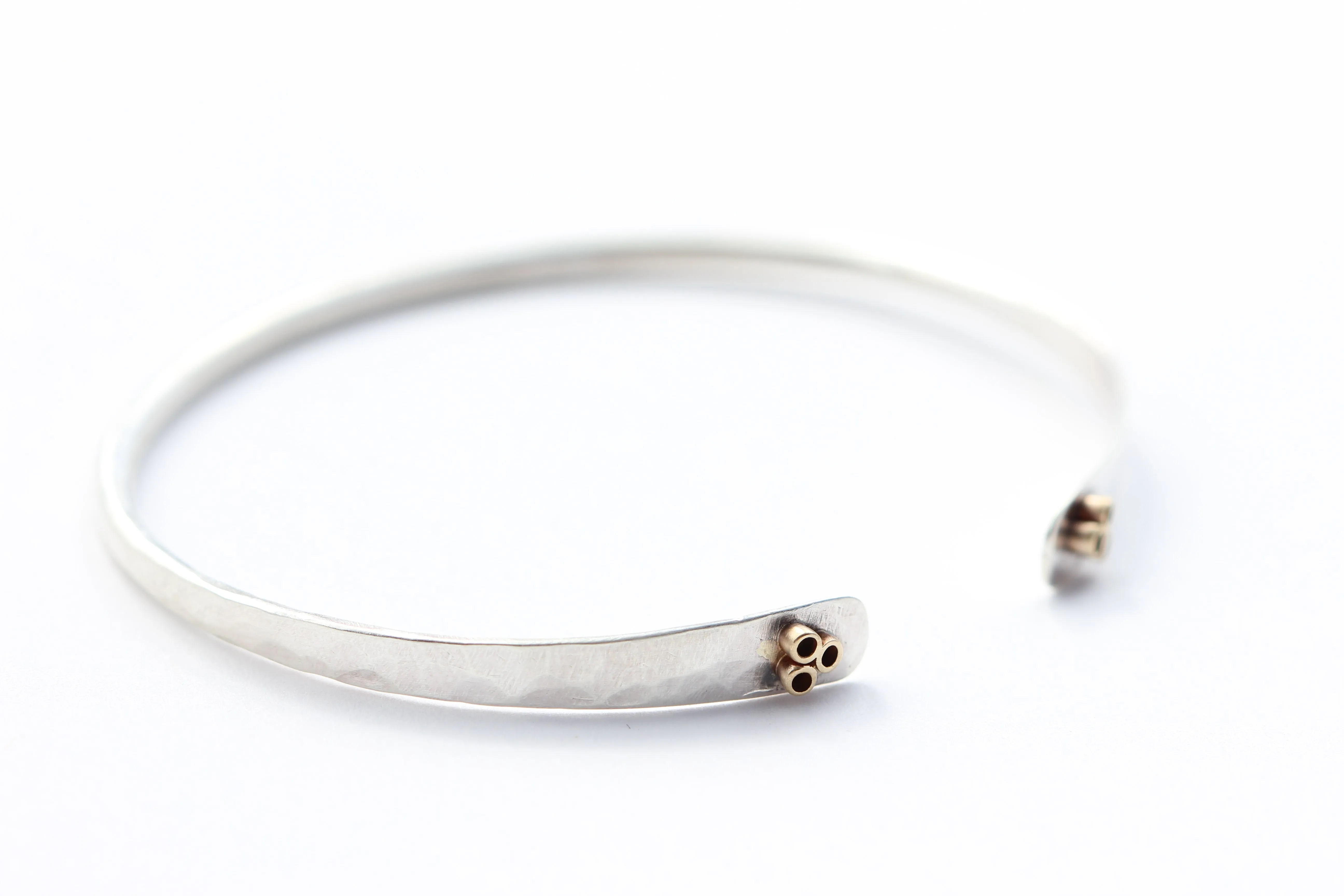 Hammered Sterling Silver Bracelet With 14k Gold flower tubes