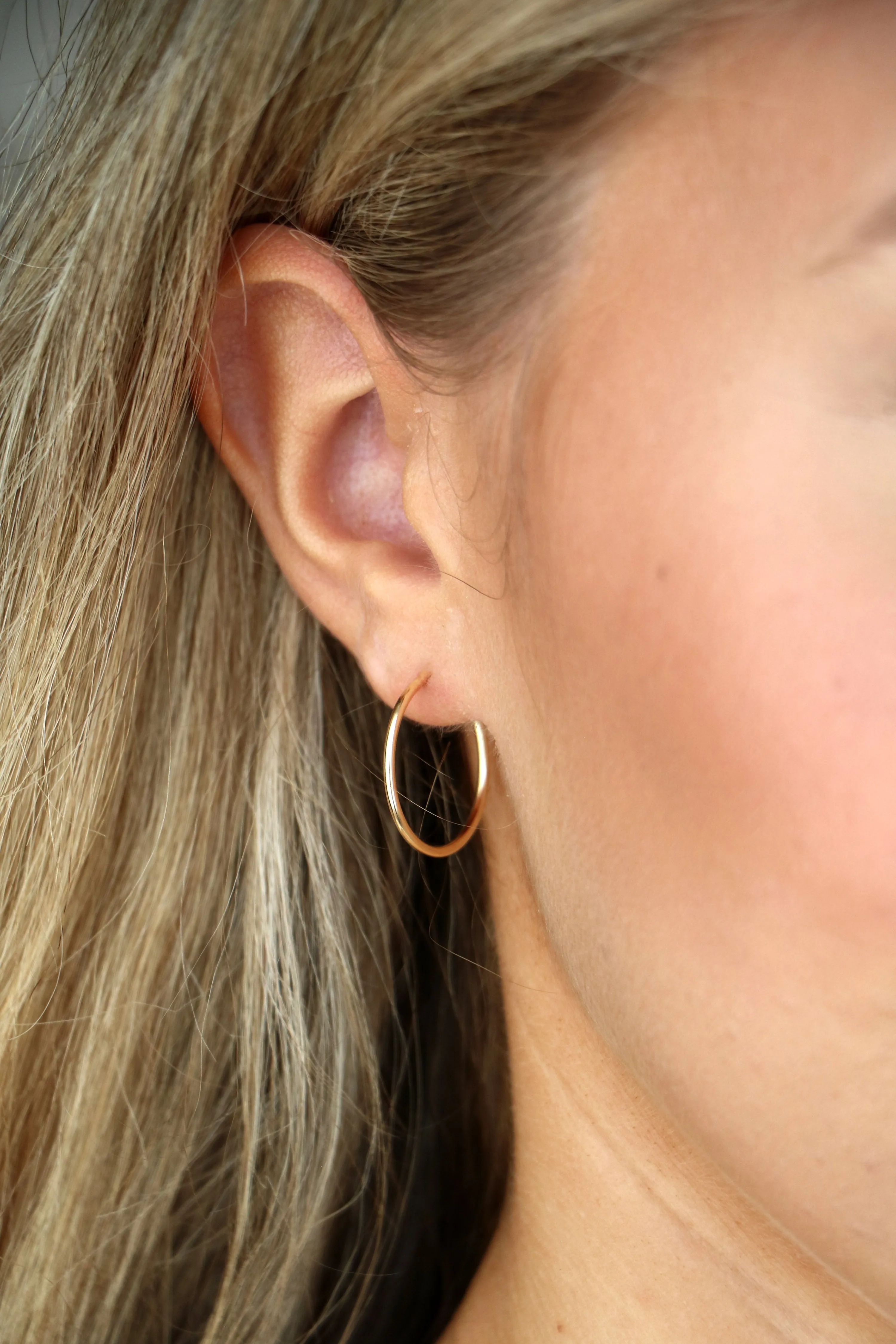 infinity hoop earrings { gold   silver }