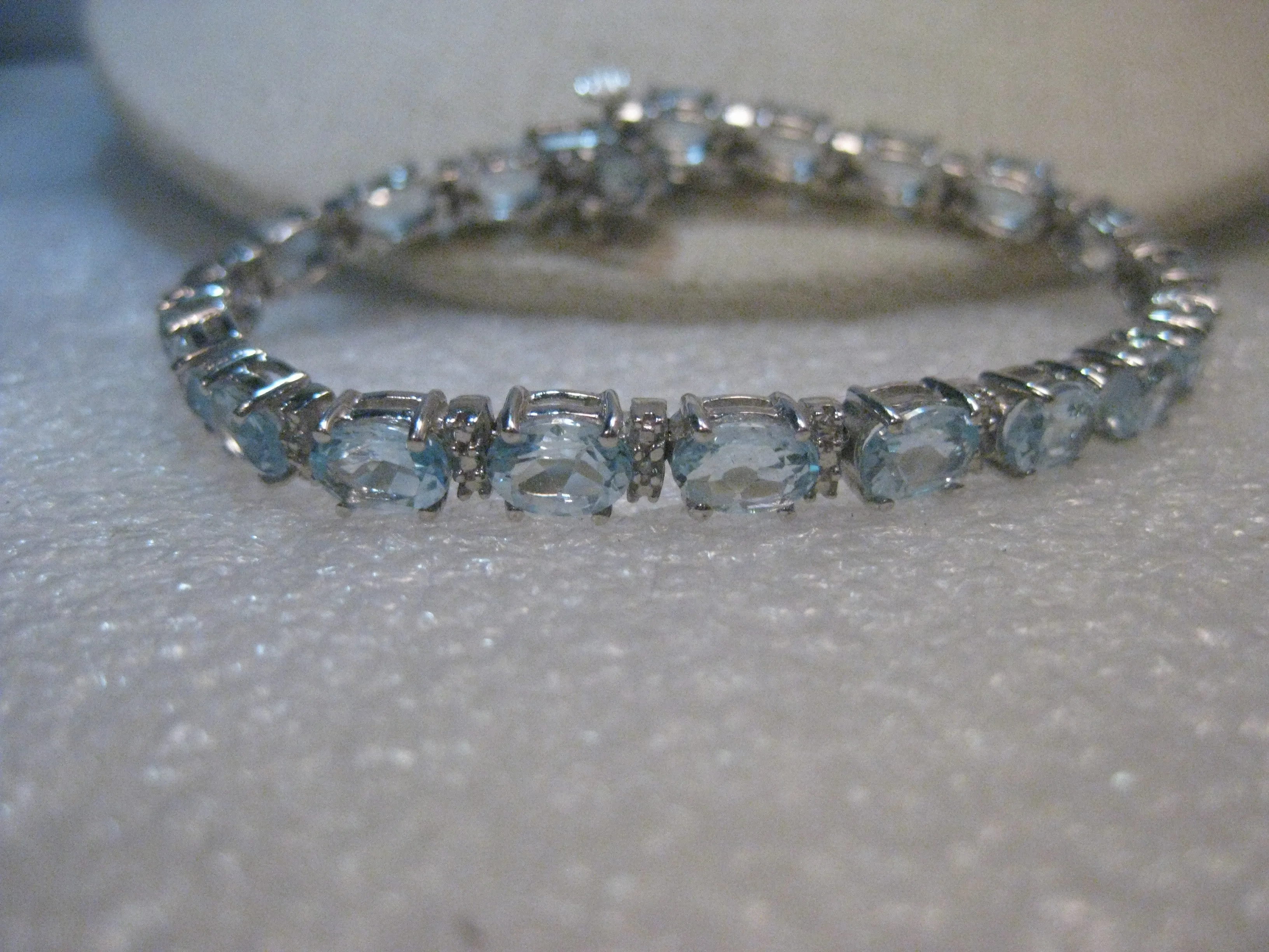 Sterling Silver Created Blue Topaz Tennis Bracelet, 7", 15.75tcw, 15.31 grams, 5mm wide