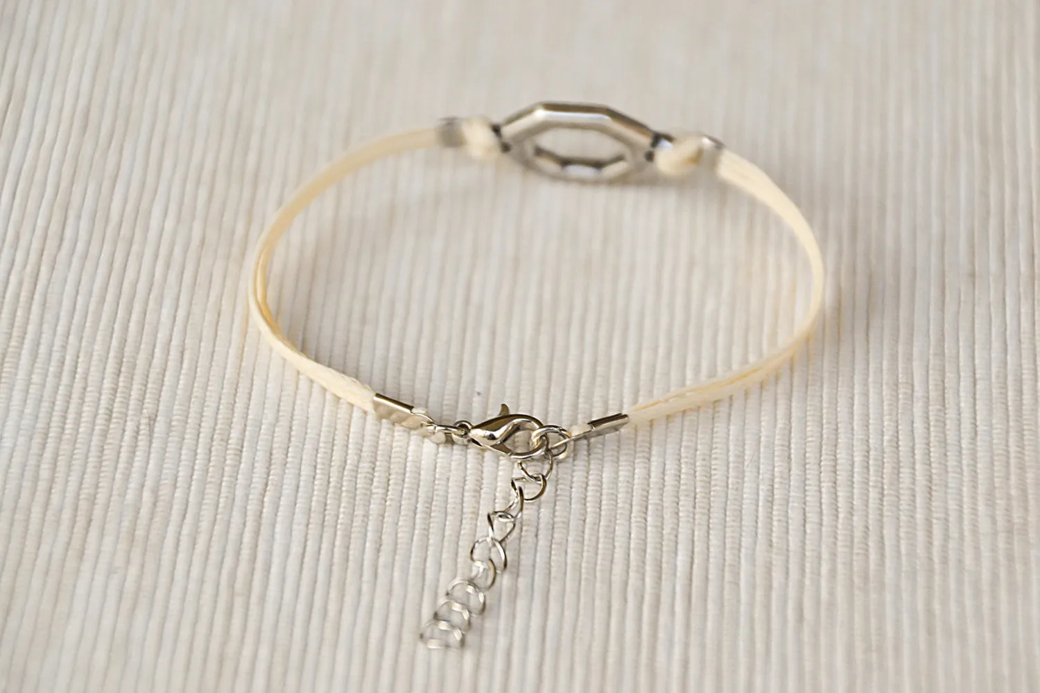 Women bracelet with silver Hexagon charm, beige cord