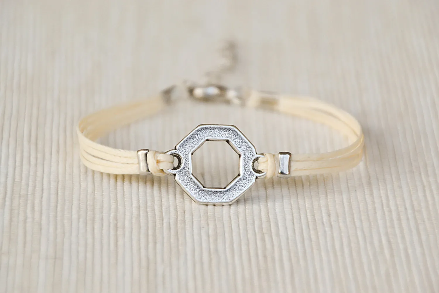 Women bracelet with silver Hexagon charm, beige cord